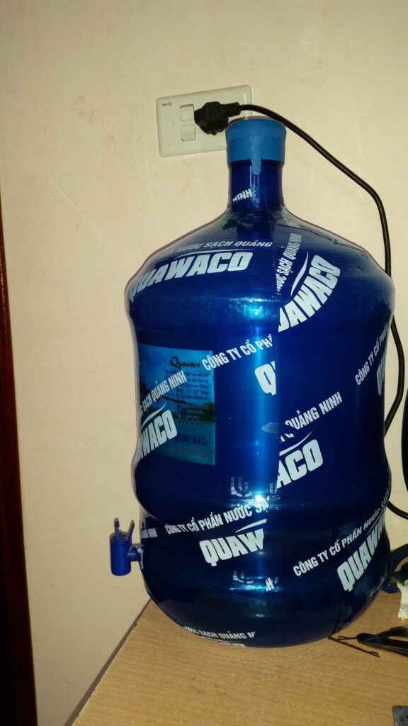 20171017_133305 Large blue bottled water dispenser plugged into wall in Vietnam