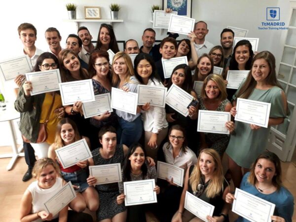 22522472_10155069900313806_1678335468_o TEFL graduates holding certificates during training course in Madrid