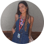 beller Portrait of a woman wearing a lanyard indoors