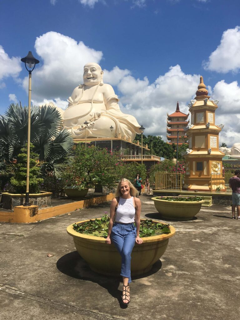 image3 Teacher visiting temple with giant Buddha statue in Vietnam