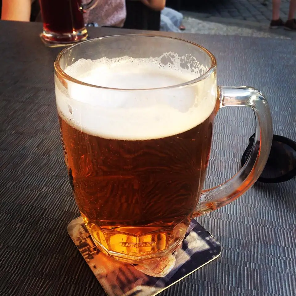 prague4 Glass of beer on outdoor table in Prague