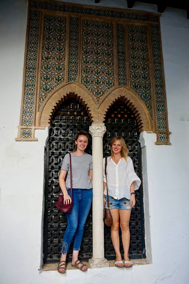 tefl2 Two women standing in decorative Moorish archway in Cordoba Spain